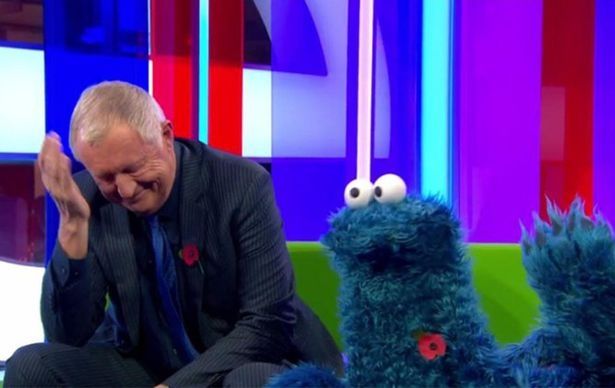 Sesame Street's Cookie Monster, with Chris Tarrant, wearing a poppy on the BBC's One Show. What a sad indictment of the UK. 