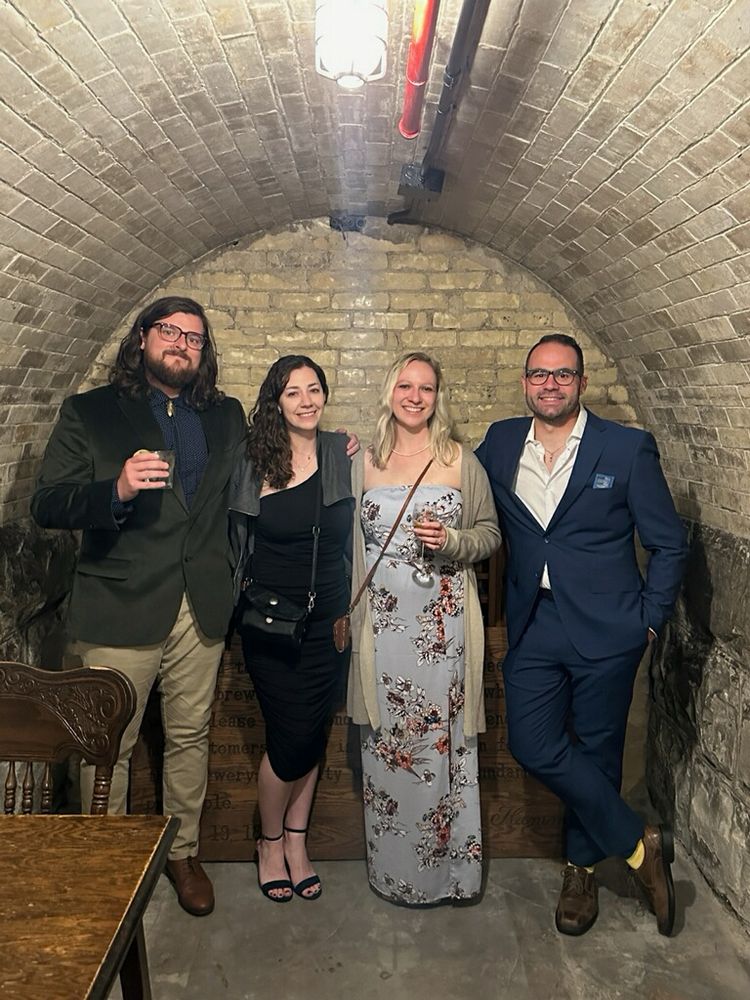 The first four Gamble Lab PhD students looking fancy at the Pabst Mansion
