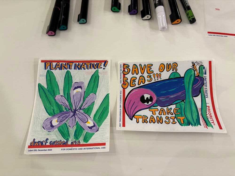 Two hand colored postal stickers, the first with an illustration of a purple flower and text “Plant Native! Dwarf crested iris”, the second with an illustration of a cuttlefish and text “Save our seas! Take transit”