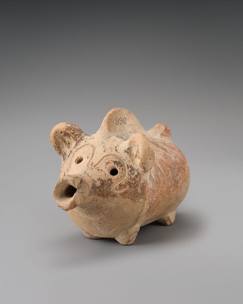 A ceramic baby rattle from the met shaped like a pig. However it doesn't look much like a pig, it's giving creature saying ooooooo. It's adorable.