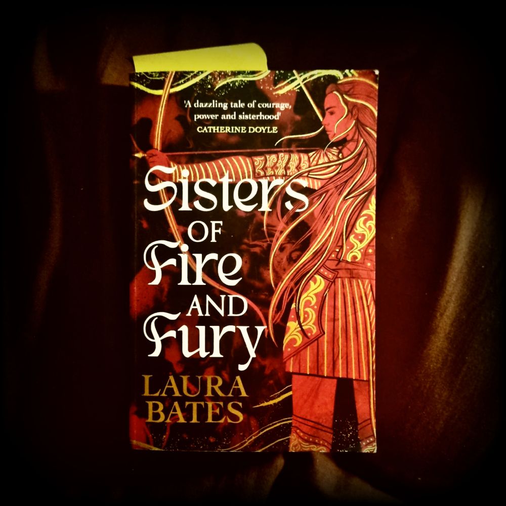 Book cover with an illustration of a girl drawing a bow. It's all in red and black and gold. 