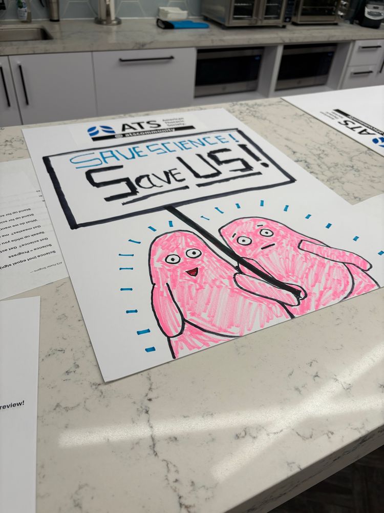 A poster drawing of a pair of pink lungs looking like humans, holding a sign reading “Save Science, Save Us!”
