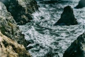 Bodega Bay National Park scene of waves and jagged rocks
