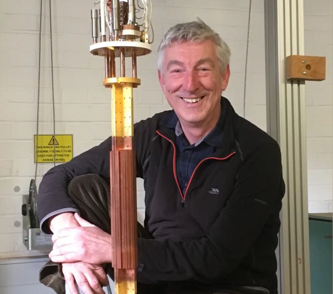 Professor John Saunders with scientific apparatus