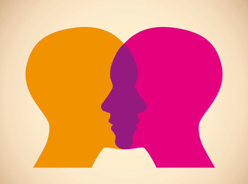 Two head silhouettes overlapping in the middle.