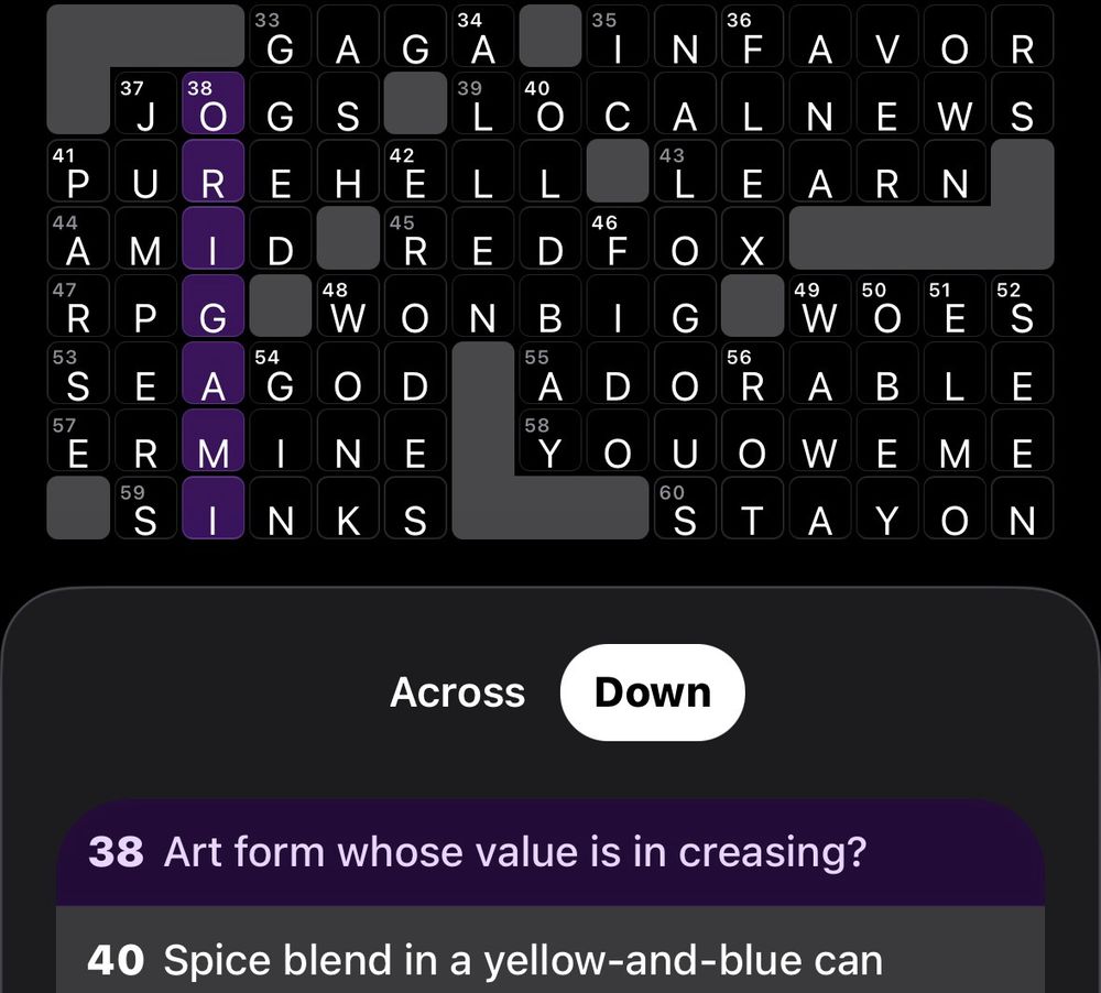 Cropped screenshot of an Apple News crossword puzzle with 38 Down highlighted. The solution is “origami” and the clue is “Art form whose value is in creasing”.