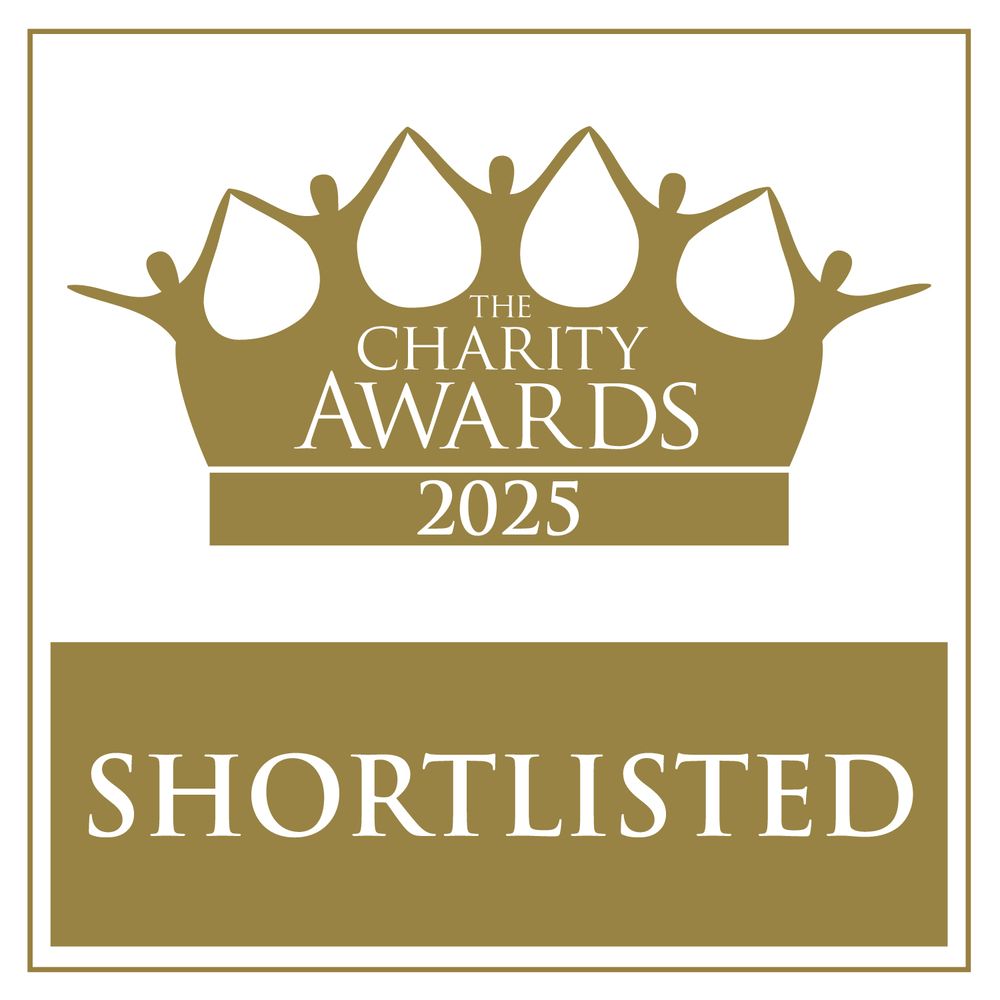 A logo of a gold crown for the Charity Awards 2005 with the word 'Shortlisted' across the bottom