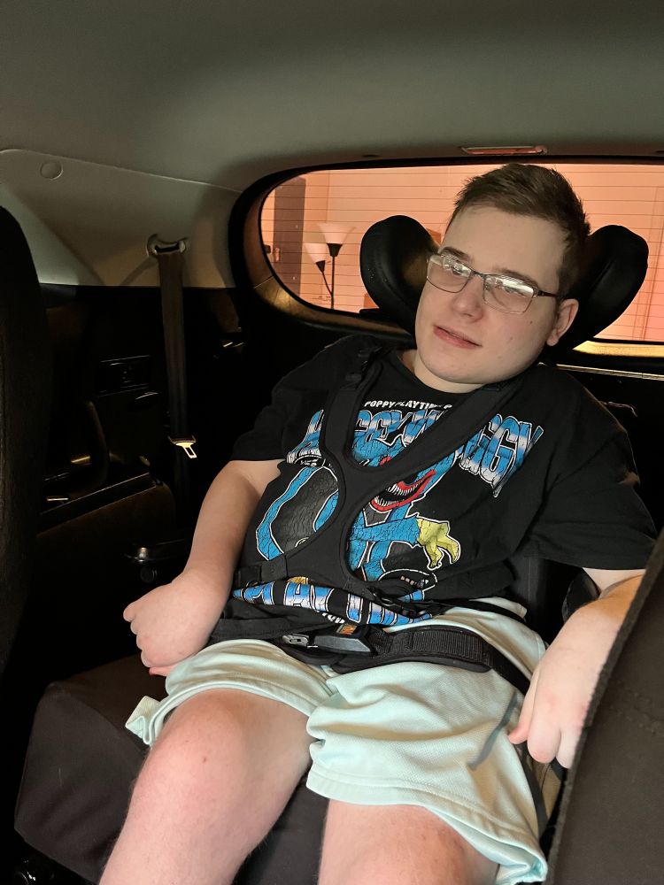 A shot of Jason inside the car in his wheelchair, locked into place and ready for adventure. 