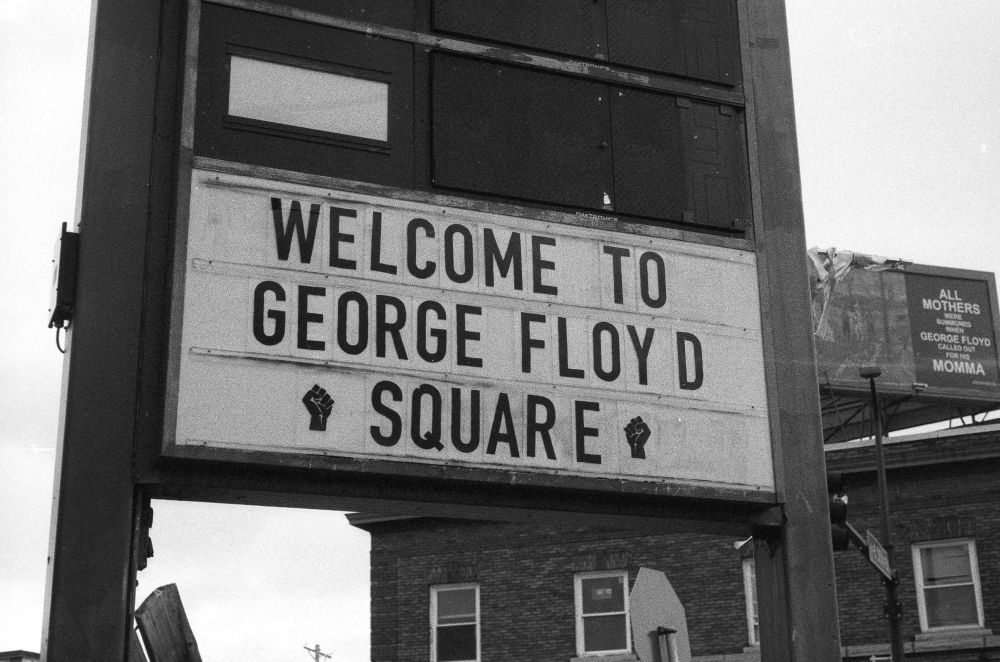 A sign reads “Welcome to George Floyd Square”