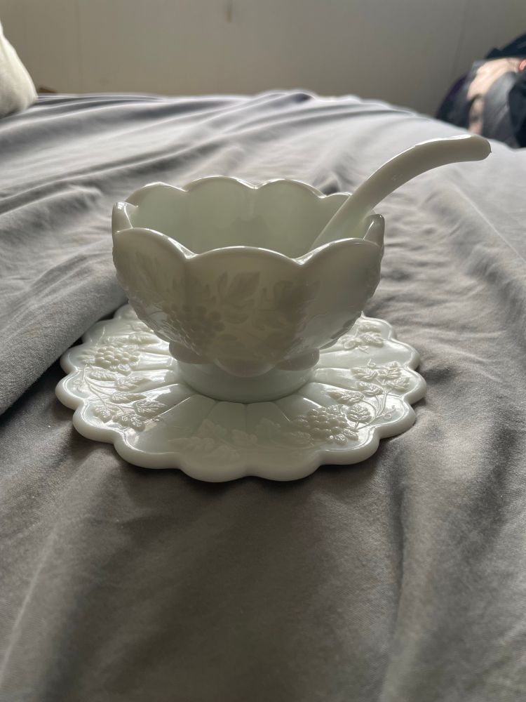 White opaque glass bowl, saucer and spoon with grape pattern on it