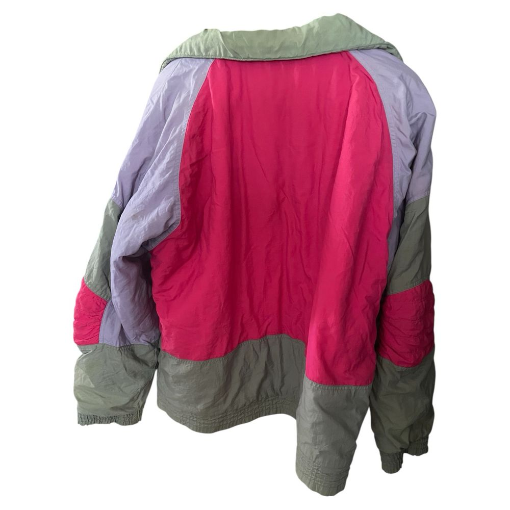 Back of pink, purple and gray snowboard jacket 