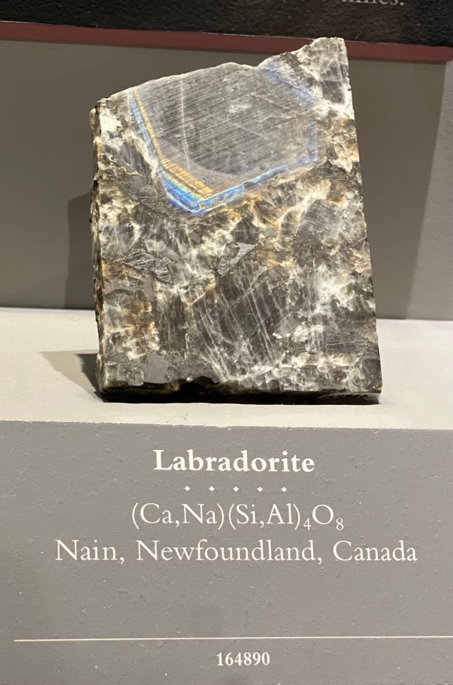 Plagioclase feldspar with zoned labradorescence