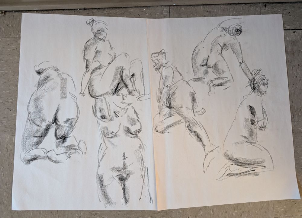Charcoal gesture drawings of a woman in various poses