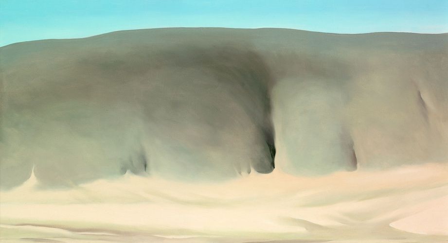 The Black Place was Georgia O’Keeffe’s name for one of her favorite locations to paint, discovered as she toured New Mexico in her Model A Ford. Located in the Bisti Badlands about 150 miles from Ghost Ranch, the dude ranch north of Abiquiu where O’Keeffe lived in the summer, the Black Place featured a landscape of numerous black and gray hills. O’Keeffe later described the terrain as looking “like a mile of elephants—grey hills all about the same size with almost white sand at their feet.” In The Black Place, she emphasized the rolling continuity of the rounded hills.

Alfred Stieglitz Collection, gift of Georgia O'Keeffe