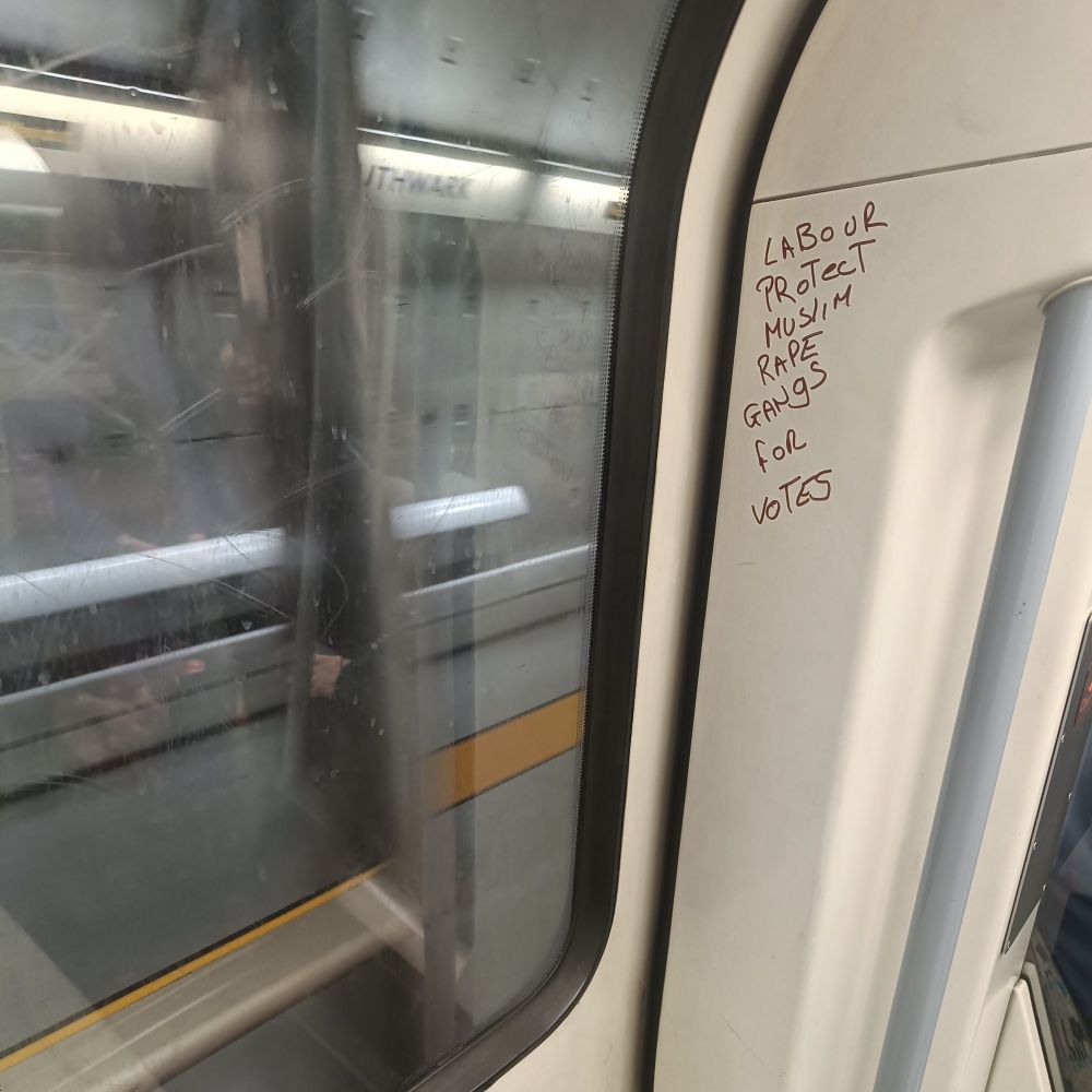 Graffiti on the Jubilee Underground train line accusing Labour of "protect(ing) Muslim rape gangs for votes" - a claim that the most basic investigation would find to be hard to support