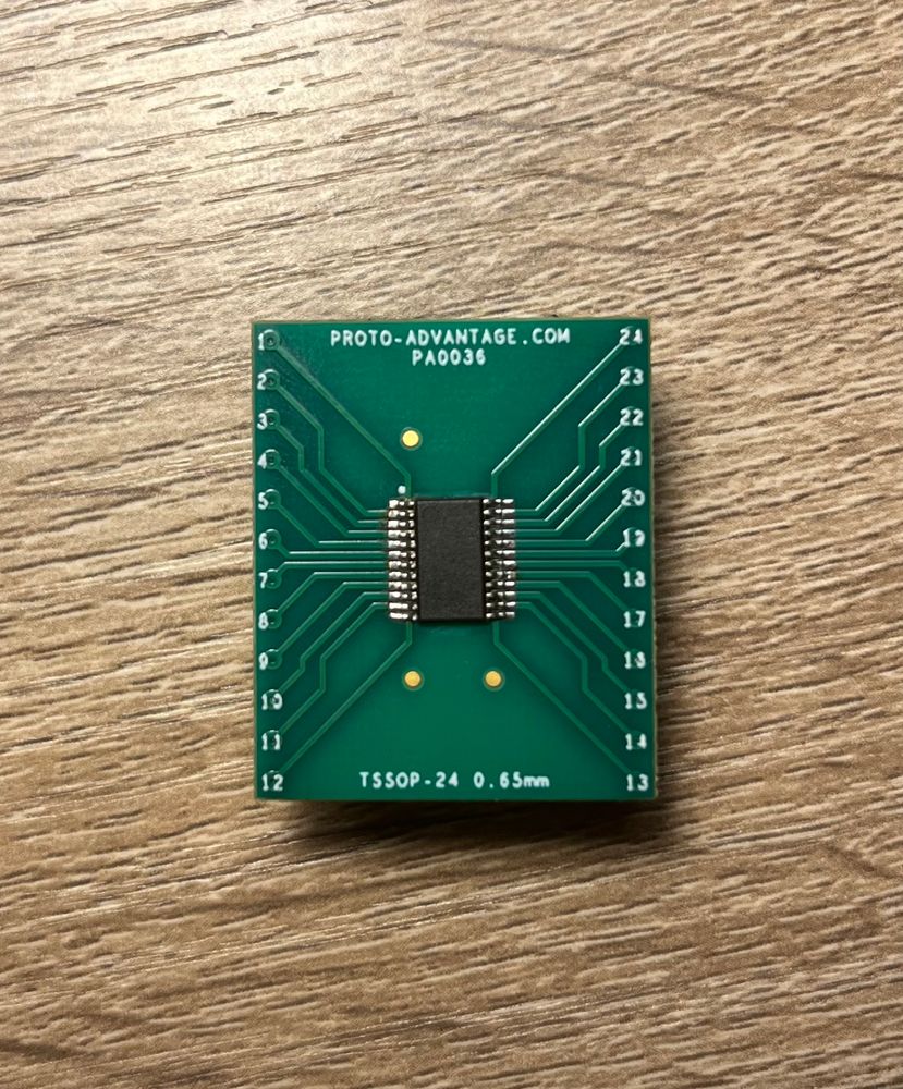 A MAX11270 signal conditioner in a TSSOP-24 package, soldered amateurishly onto a DIP breakout board. 