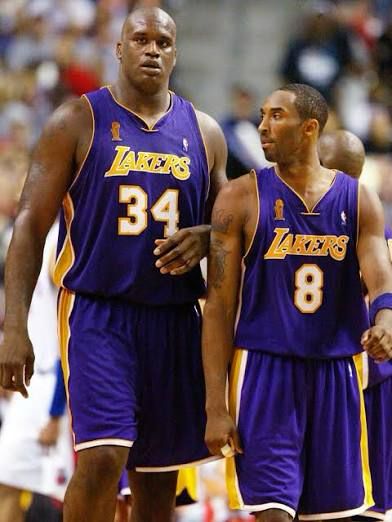 Shaq standing by Kobe