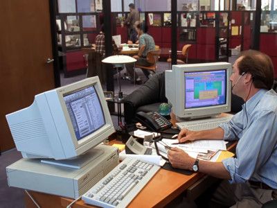 Angela's Boss at Cathedral has a Compaq Prolinea on his desk.
