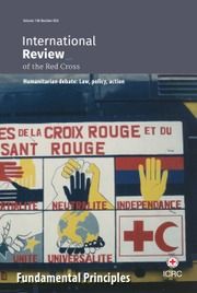 Image shows cover of the latest issue of the International Review of the Red Cross, depicting the fundamental principles with different coloured hands.