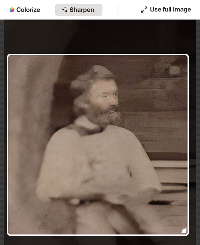 The blurry photo of a bearded man now has detailed teeth and eyes. It looks scary and wrong oh noooo