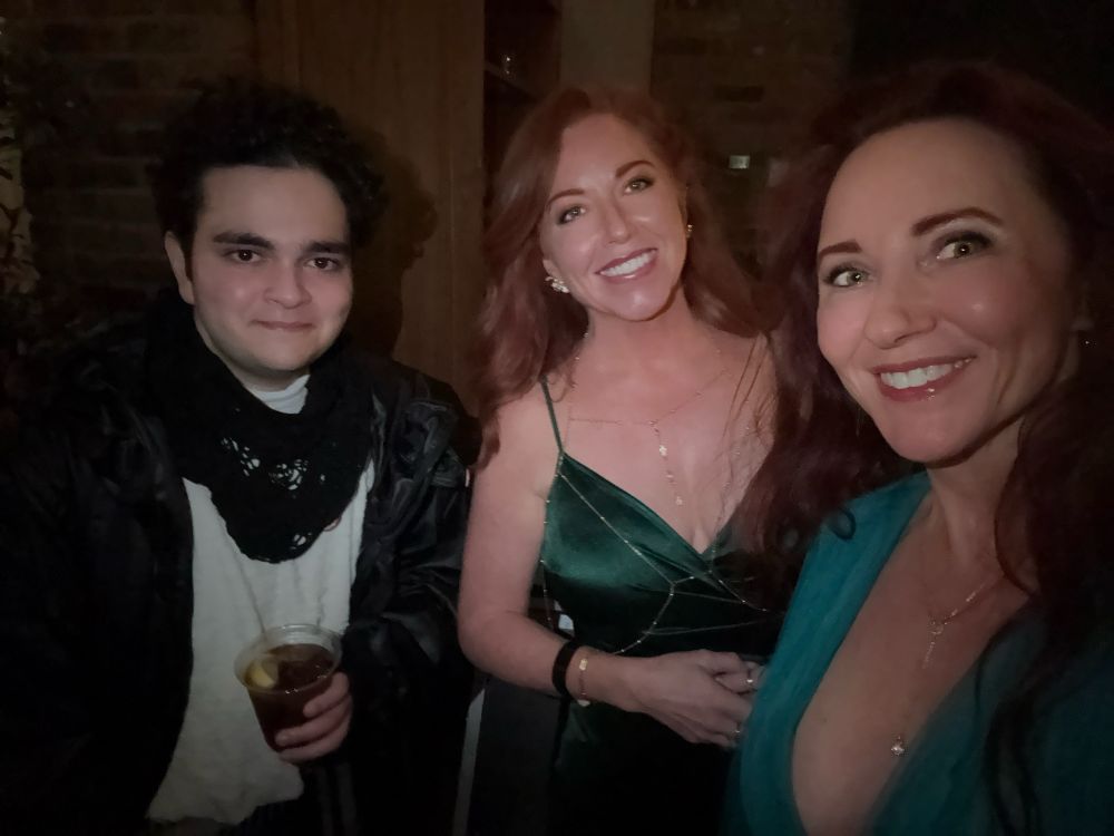 Bill, Lori, me, all dressed up and smiling