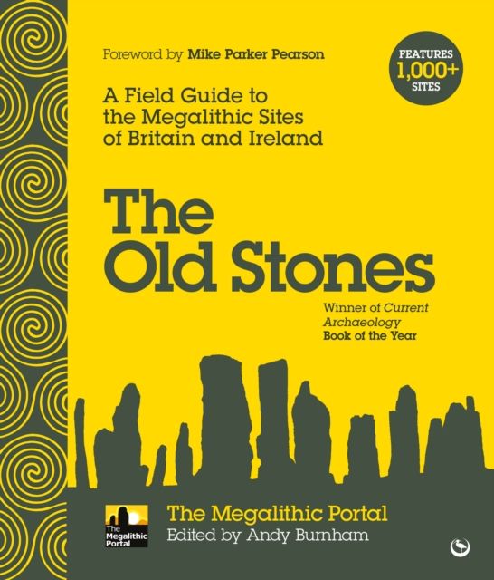The book cover of The Old Stones : A Field Guide to the Megalithic Sites of Britain and Ireland, Edited by Andy Burnham. This has a mustard-yellow background with the title and silhouette of a set of standing stones in a warm grey, there are yellow spiral swirls in triskelion formations against a grey background on the left hand margin area.