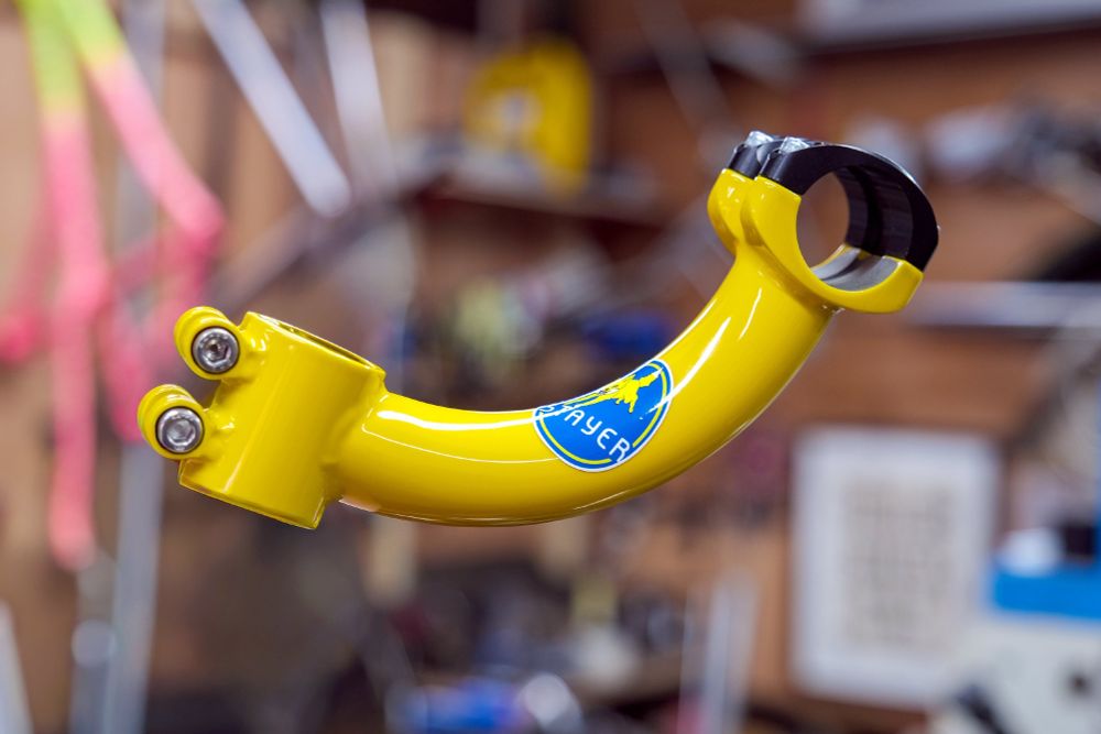 a phallic bicycle stem painted and branded like a Chiquita banana 