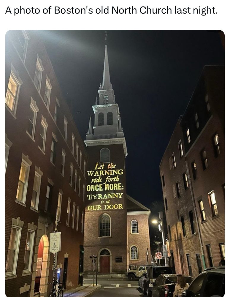 A photo of Boston’s old North Church last night.

Projection on the building says “Let the warning ride forth once more: tyranny is at our door.”