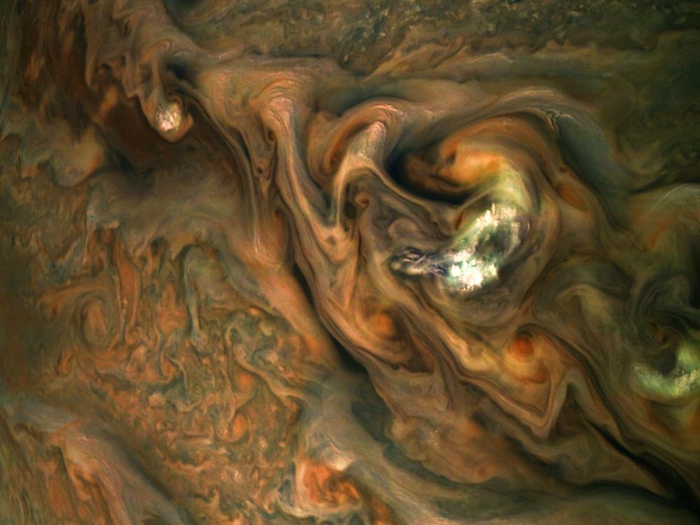 A picture from the Juno spacecraft cameras looking down at Jupiter's storms