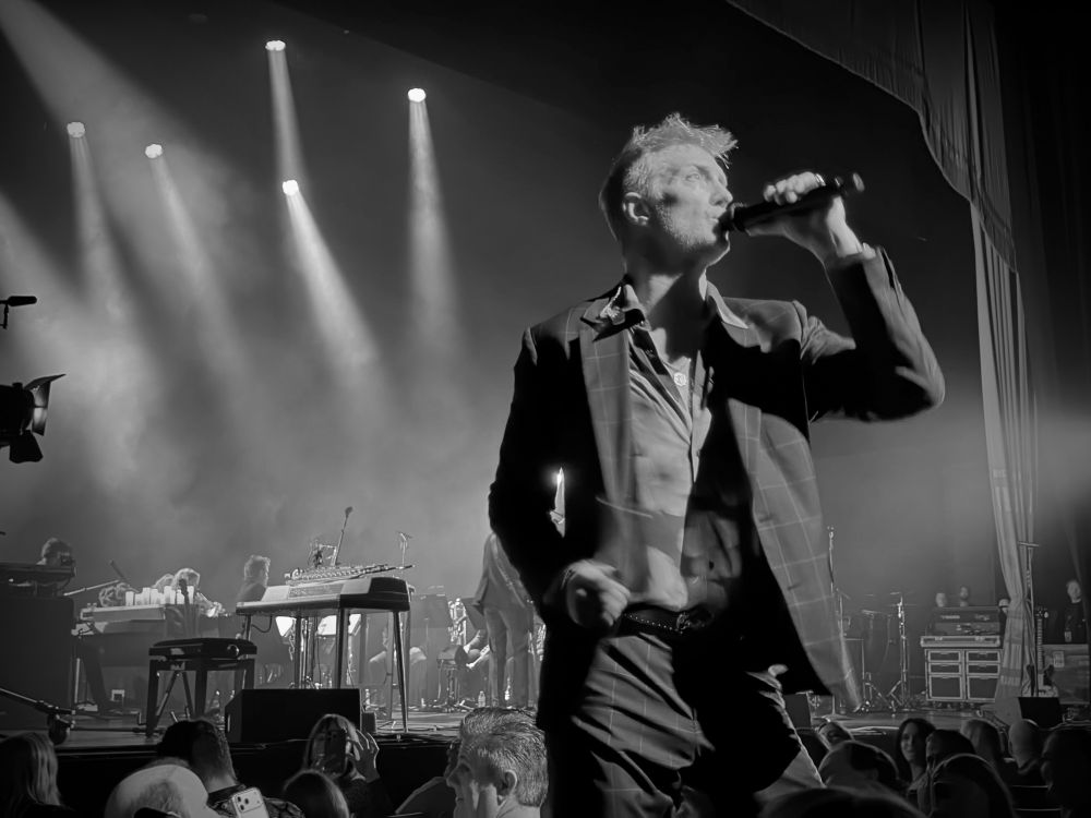 Queens of the Stone Age performing on stage in Austin, TX. 