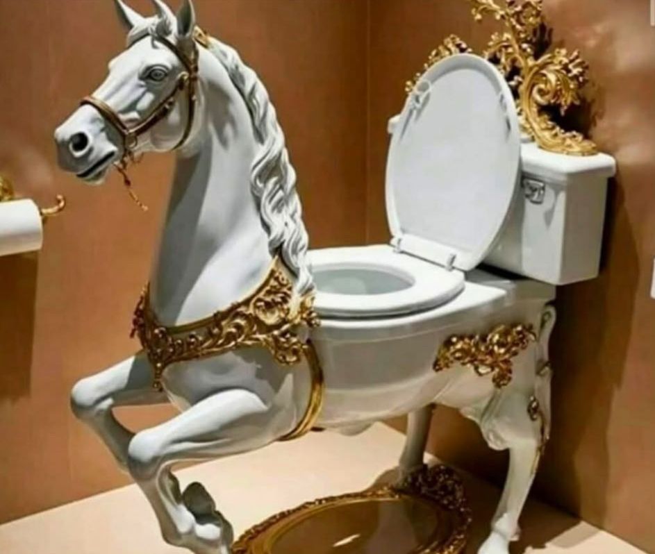 A fancy ol’ white porcelain galloping with gold trim, the body of the horse has been replaced very elegantly and carefully with a toilet seat 
