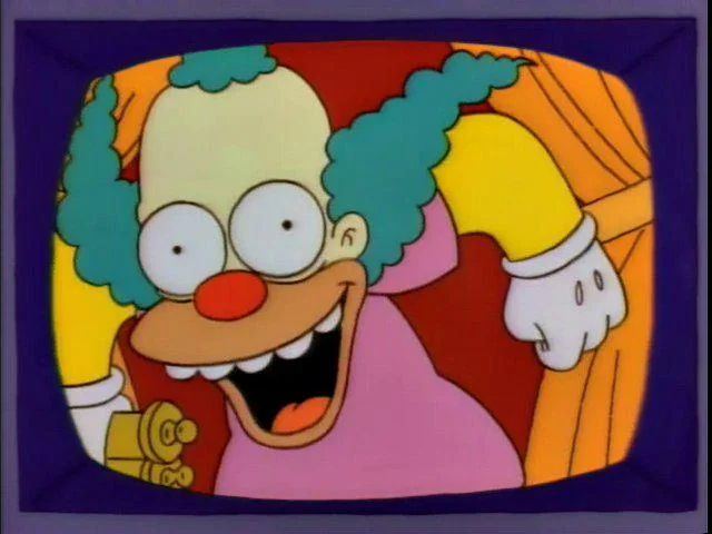 Krusty the Clown right up in the camera laughing excitedly after announcing the death of Dick Cheney 
