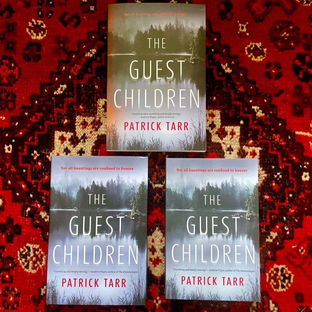 Three editions of the supernatural mystery The Guest Children by Patrick Tarr, with a creepy lake and trees featured on the cover. 