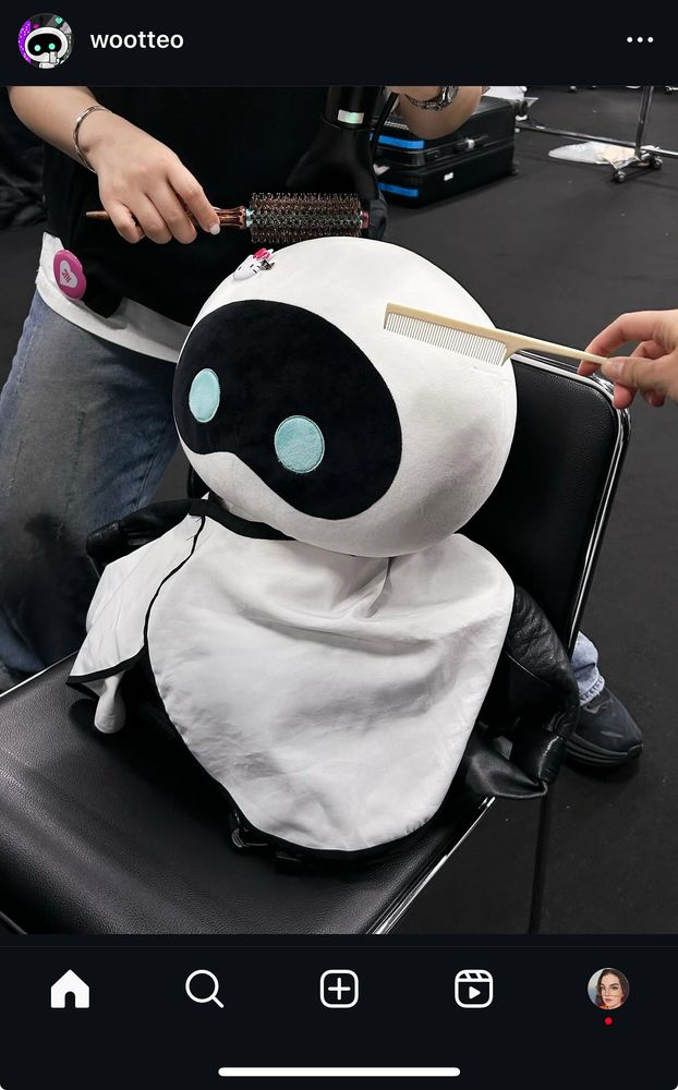 Instagram pic of wooteo getting its hair and makeup done backstage 