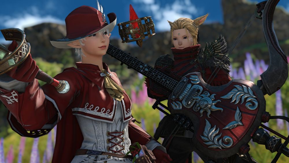 Diana and Alisaie in a field on the Isle of Haam. Diana is in her bard attire and is holding a hybrid guitar/bow, while Alisaie is in her more ornate duelist attire and has her rapier ready. Alisaie is giving Diana a grin, while Diana returns with a slight smile.