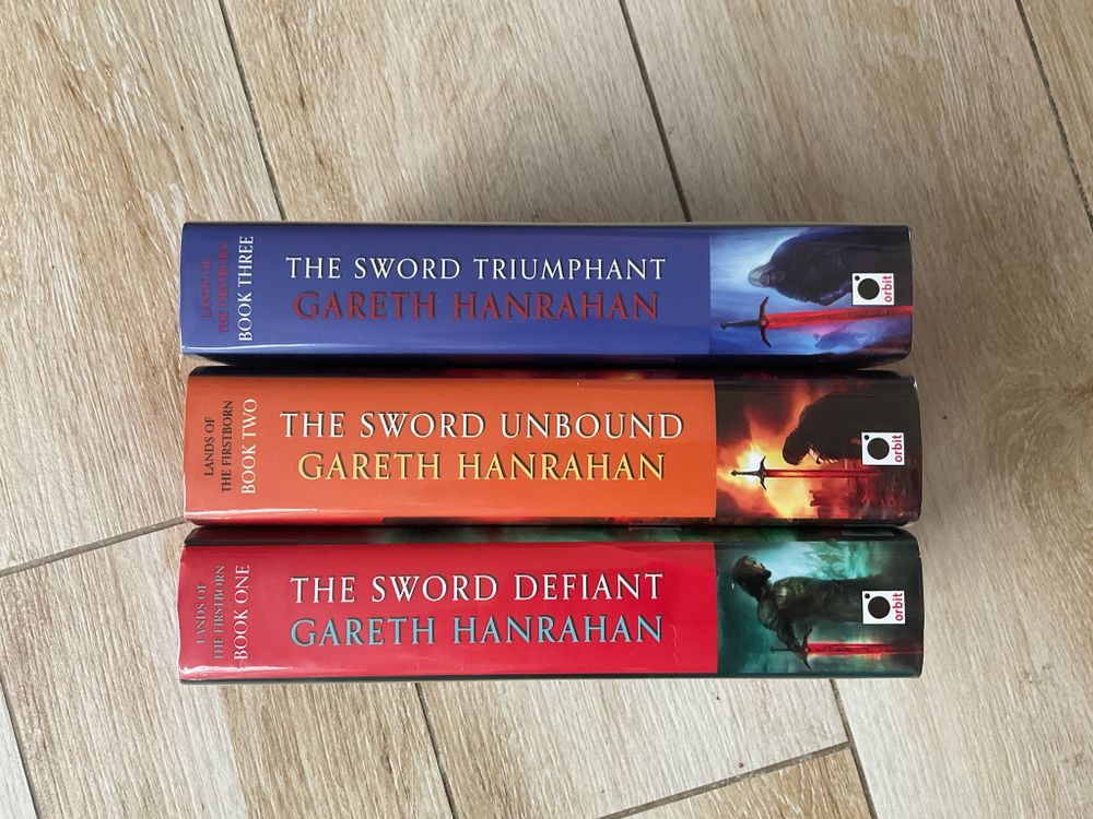 Spines of the three books