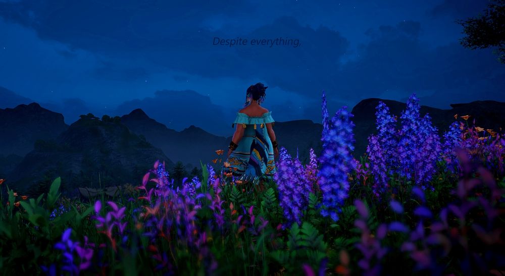 pictured: Rhemi (pre arr), standing on a cliff filled with wildflowers , back towards the camera, looking out to the horizon at night.