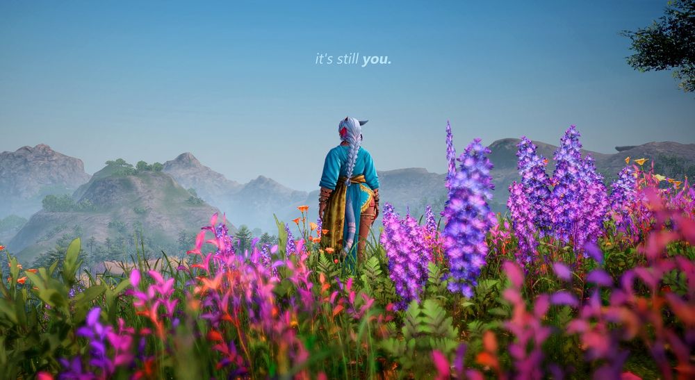 pictured: Rhemi (post 7.0), standing on a cliff filled with wildflowers , back towards the camera, looking out to the horizon in the morning.