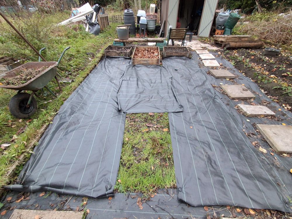 A covered allotment plot.
