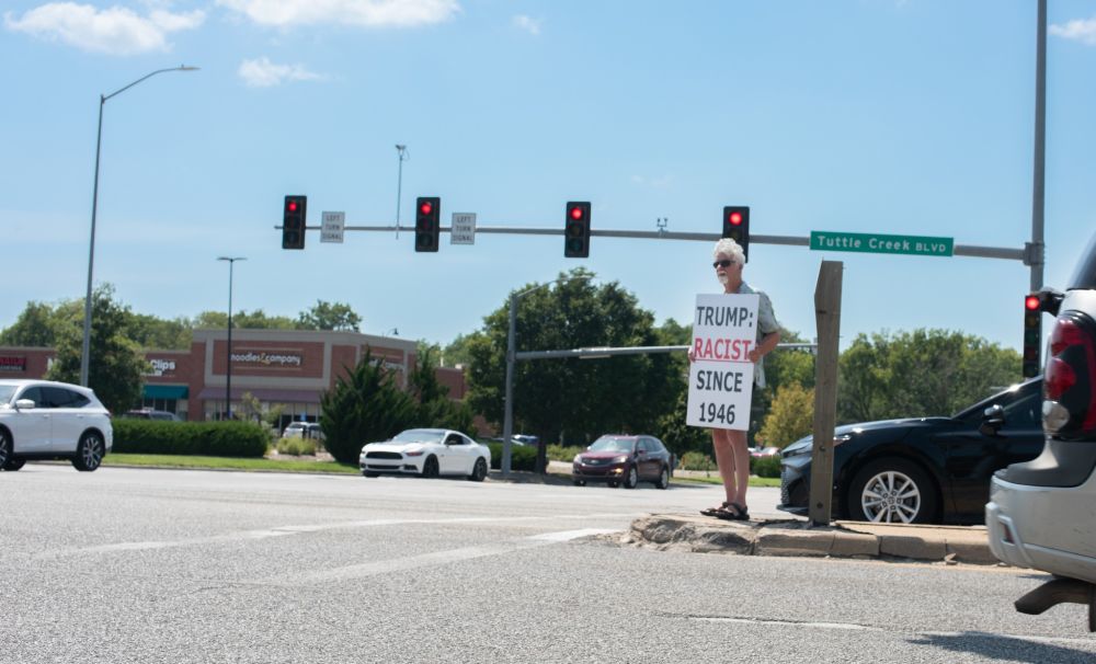 Intrepid Protester intersection of US Hwy 24 and Bluemont Ave. - Turtle Creek Blvd Manhattan
TRUMP RACIST SINCE 1946