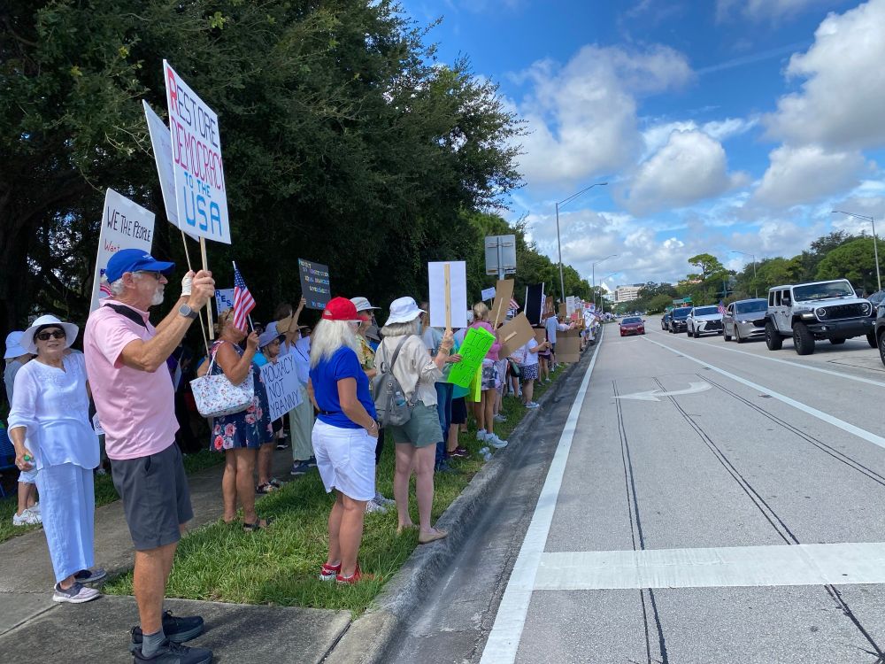 Resisters on roadside Palm Beach Gardens, Florida Labor Day