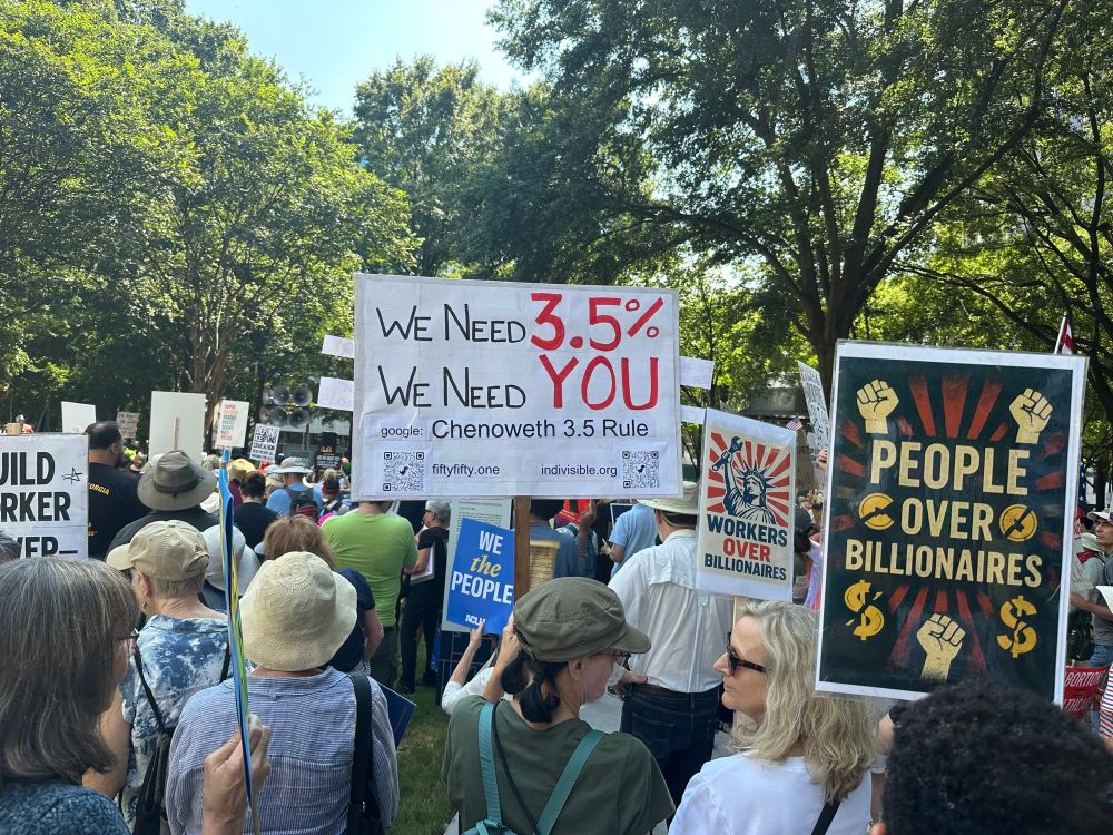 Resisters march Atlanta GA Labor Day
signs WE NEED 3.5% WE NEED YOU - PEOPLE OVER BILLIONAIRES
WORKERS OVER BILLIONAIRES