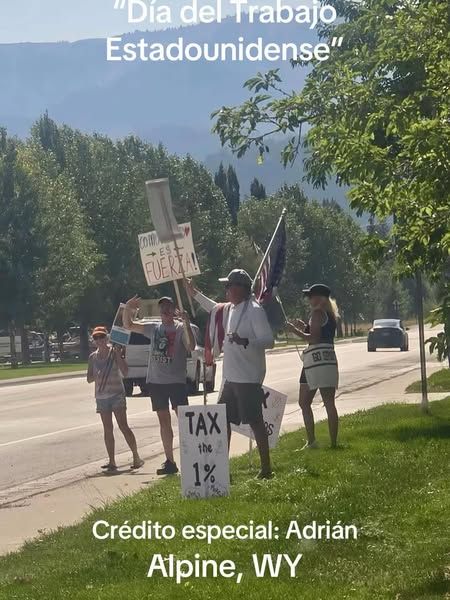 Resisters on sidewalk Alpine WY Labor Day WORKERS OVER BILLIONAIRES - TAX THE 1% Dia del Trabajo Estadounidense -credito especial Adrian