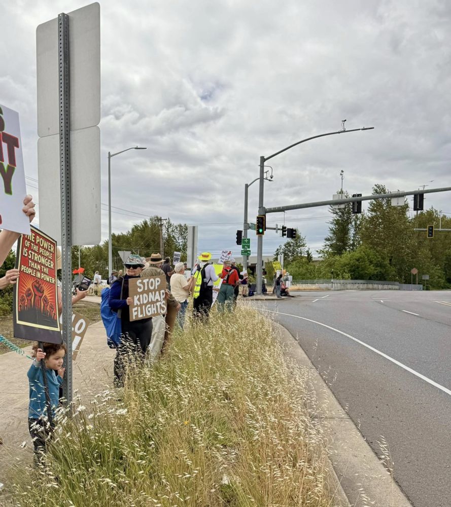 protesters on roadside w/ signs at SALEM, OREGON’S AIRPORT
STOP KIDNAP FLIGHTS