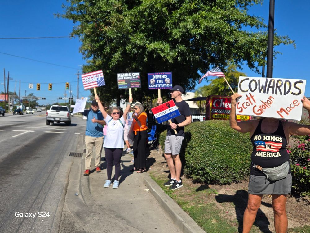 Resisters along road Hanahan suburb North Charleston, SC COWARDS SCOTT GRAHAM MACE - 8647 American distress flag DEFEND THE CONSTITUTION 