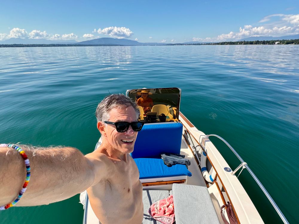 Selfie with an emerald lake on a blue sky looking East