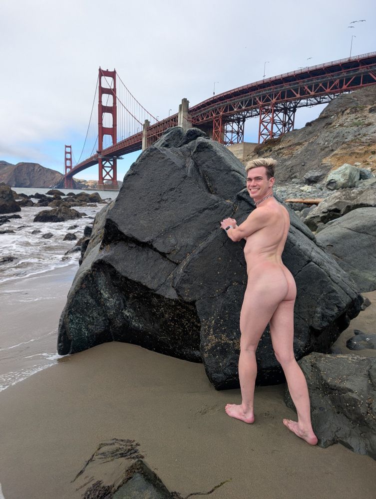 A nude of me from behind. I am leaning myself against a rock and pushing my ass out. The golden gate bridge is in the background 