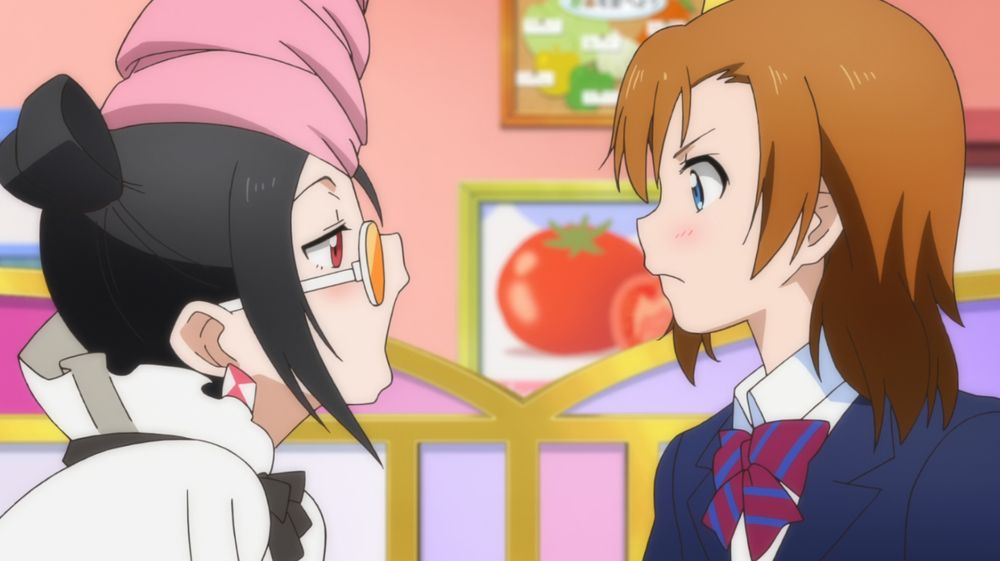 Nico opens her mouth showing Honoka the lack of fries.