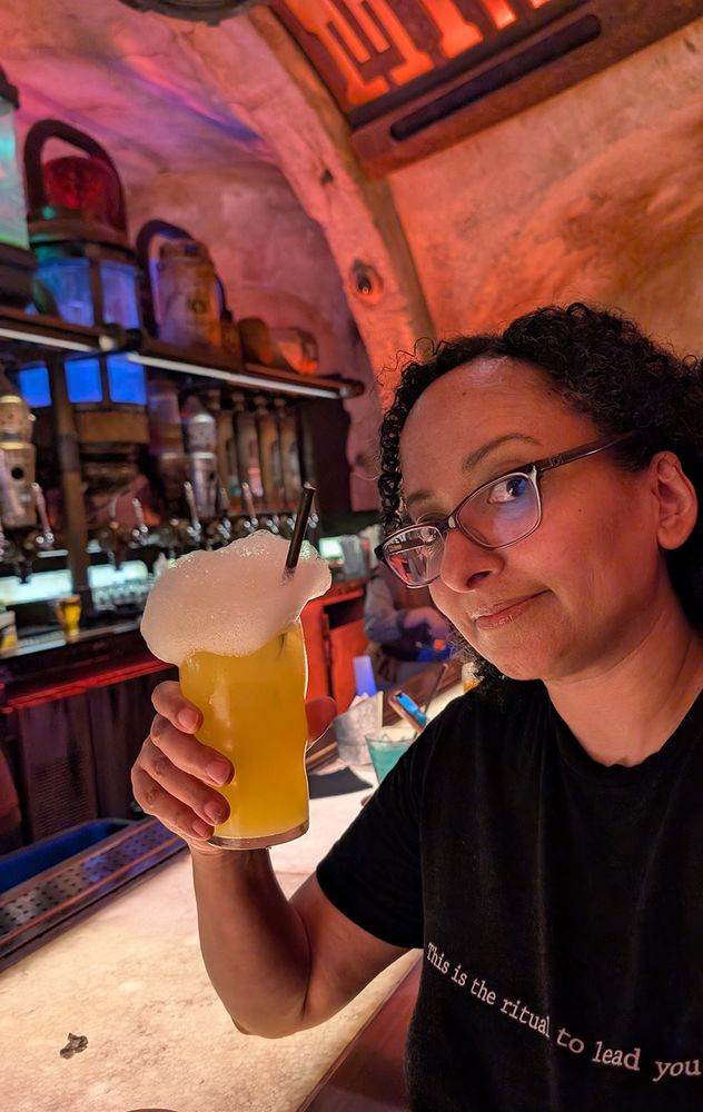 Holding up a "Fuzzy Tauntaun" drink at Galaxy's Edge at Disneyland while wearing a shirt that only cool people understand the reference to