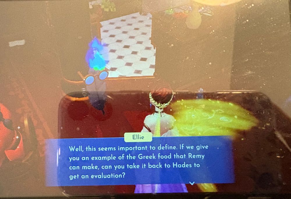 Player character thwarting the food inspector quill:

Well, this seems important to define. If we give you an example of the Greek food that Remy can make, can you take it back to Hades to get an evaluation?

(Yes, the evil IRS & health and safety inspectors work for the devil. It’s very subtle.)
